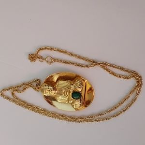 Budda with Faux green stone?Goldtone Chain 22in chain pendant 2inHx1 3/4in.W